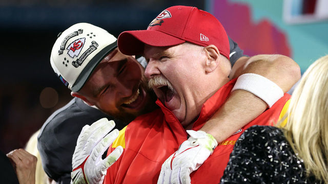 GLENDALE, ARIZONA - FEBRUARY 12: Travis Kelce #87 and head coach Andy Reid of the Kansas City Chiefs celebrate after defeating the Philadelphia Eagles 38-35 in Super Bowl LVII at State Farm Stadium on February 12, 2023 in Glendale, Arizona.
