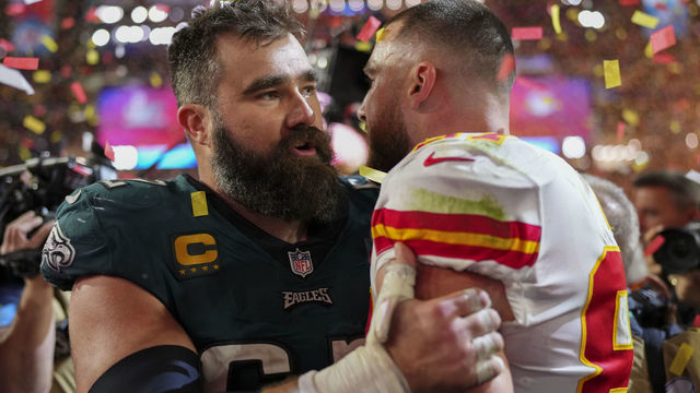 GLENDALE, AZ - FEBRUARY 12: Jason Kelce #62 of the Philadelphia Eagles speaks with Travis Kelce #87 of the Kansas City Chiefs after Super Bowl LVII at State Farm Stadium on February 12, 2023 in Glendale, Arizona. The Chiefs defeated the Eagles 38-35.