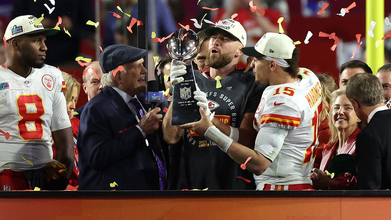 GLENDALE, ARIZONA - FEBRUARY 12: Travis Kelce #87 of the Kansas City Chiefs and Patrick Mahomes #15 of the Kansas City Chiefs celebrate with the Vince Lombardi Trophy after the Kansas City Chiefs beat the Philadelphia Eagles in Super Bowl LVII at State Farm Stadium on February 12, 2023 in Glendale, Arizona.