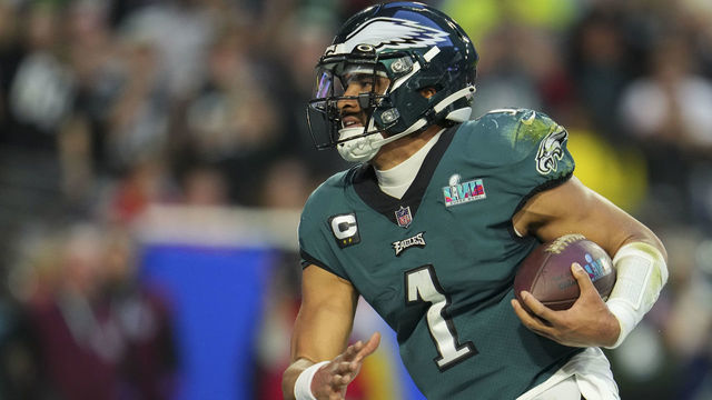 GLENDALE, AZ - FEBRUARY 12: Jalen Hurts #1 of the Philadelphia Eagles runs the ball in for a touchdown against the Kansas City Chiefs during the second quarter in Super Bowl LVII at State Farm Stadium on February 12, 2023 in Glendale, Arizona.