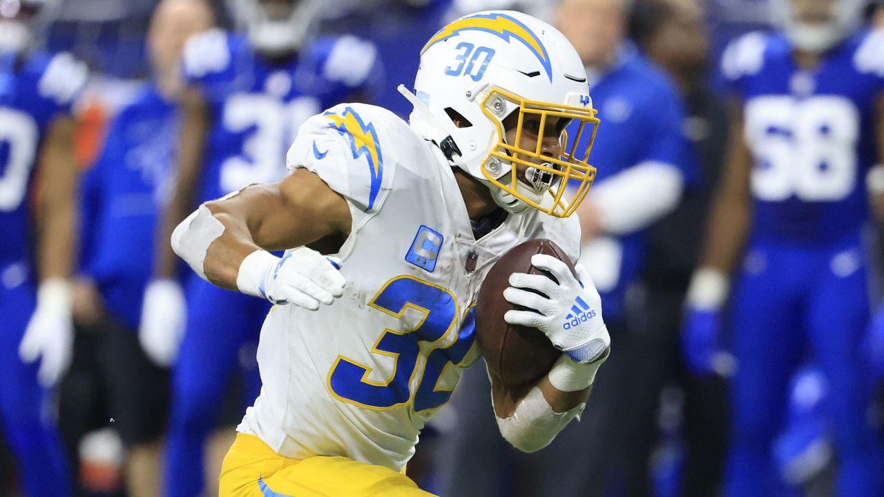 INDIANAPOLIS, INDIANA - DECEMBER 26: Austin Ekeler #30 of the Los Angeles Chargers runs the ball in the game against the Indianapolis Colts at Lucas Oil Stadium on December 26, 2022 in Indianapolis, Indiana.