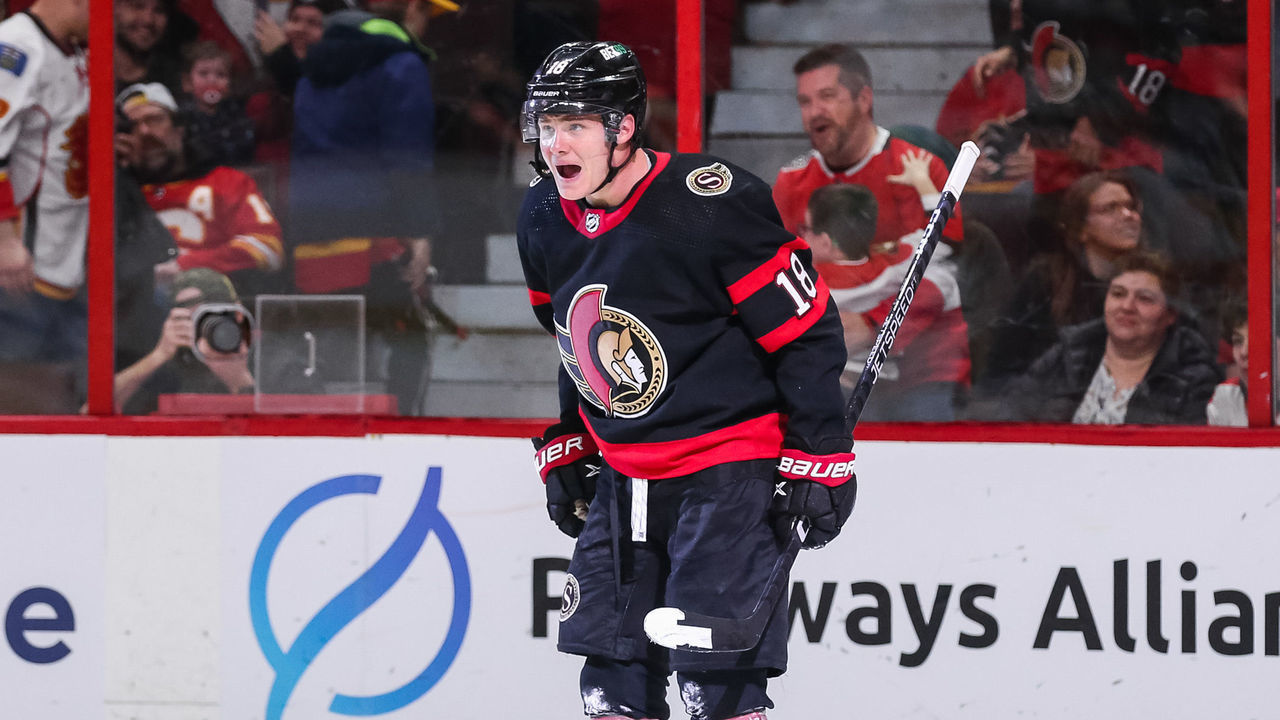 OTTAWA, CANADA - FEBRUARY 13: Tim Stützle #18 of the Ottawa Senators celebrates his overtime game winning goal against the Calgary Flames at Canadian Tire Centre on February 13, 2023 in Ottawa, Ontario, Canada.