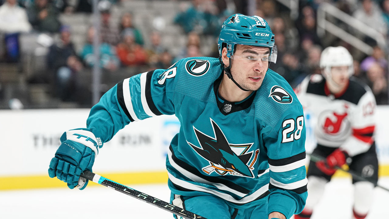 SAN JOSE, CA - JANUARY 16: Timo Meier #28 of the San Jose Sharks skates after the puck against the New Jersey Devils at SAP Center on January 16, 2023 in San Jose, California.