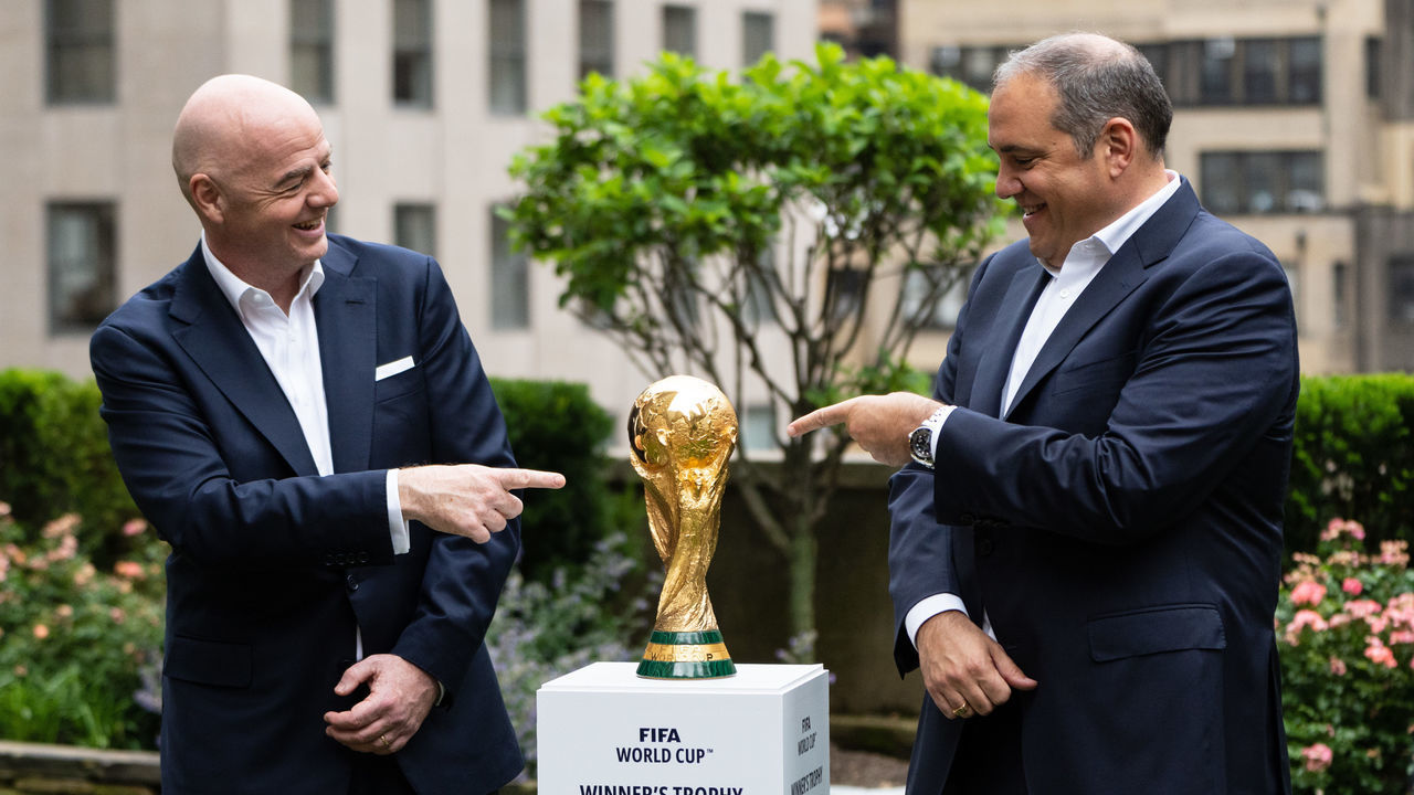 NEW YORK, NY - JUNE 16: President of FIFA Gianni Infantino and president of CONCACAF Victor Montagliani pose for photos with the FIFA World Cup winners trophy during a press conference at 30 Rockefeller Center on June 16, 2022 in New York, New York.
