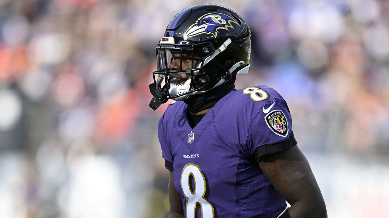 BALTIMORE, MARYLAND - DECEMBER 04: Lamar Jackson #8 of the Baltimore Ravens walks across the field during the game against the Denver Broncos at M&T Bank Stadium on December 04, 2022 in Baltimore, Maryland.