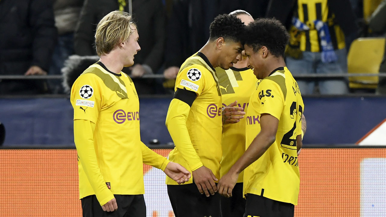 DORTMUND, GERMANY - FEBRUARY 15: Karim Adeyemi of Borussia Dortmund celebrates 1-0 with Jude Bellingham of Borussia Dortmund, Julian Brandt of Borussia Dortmund during the UEFA Champions League match between Borussia Dortmund v Chelsea at the Signal Iduna Park on February 15, 2023 in Dortmund Germany