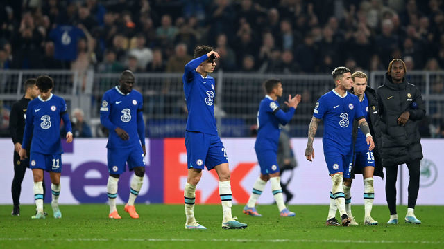 DORTMUND, GERMANY - FEBRUARY 15: Kai Havertz and Enzo Fernandez of Chelsea look dejected with teammates following defeat in the UEFA Champions League round of 16 leg one match between Borussia Dortmund and Chelsea FC at Signal Iduna Park on February 15, 2023 in Dortmund, Germany.