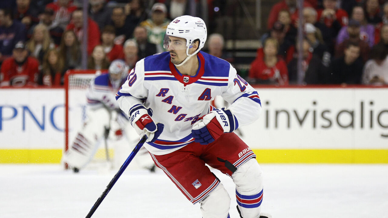 RALEIGH, NORTH CAROLINA - FEBRUARY 11: Chris Kreider #20 of the New York Rangers skates with the puck during the first period of the game against the Carolina Hurricanes at PNC Arena on February 11, 2023 in Raleigh, North Carolina.