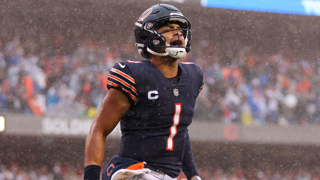 CHICAGO, ILLINOIS - SEPTEMBER 11: Quarterback Justin Fields #1 of the Chicago Bears celebrates a rushing touchdown by running back Khalil Herbert #24 of the Chicago Bears during the fourth quarter against the San Francisco 49ers at Soldier Field on September 11, 2022 in Chicago, Illinois.