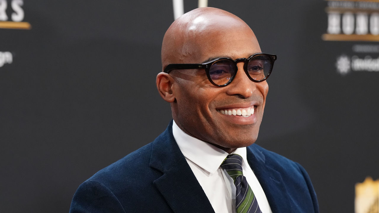 PHOENIX, AZ - FEBRUARY 09: Tiki Barber poses for a photo on the red carpet during NFL Honors at the Symphony Hall on February 9, 2023 in Phoenix, Arizona.