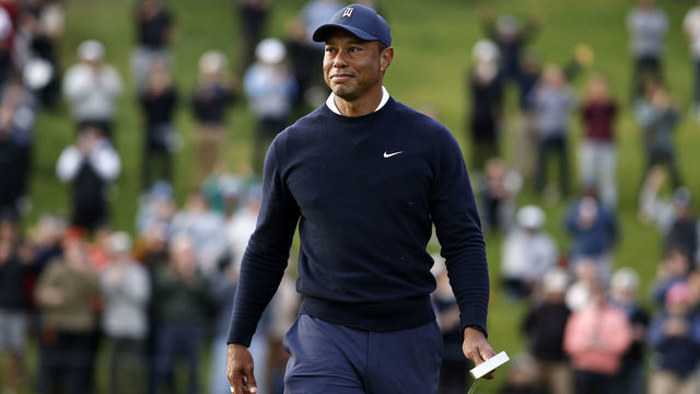 PACIFIC PALISADES, CALIFORNIA - FEBRUARY 16: Tiger Woods of the United States walks off the 18th green after finishing his round during the first round of the The Genesis Invitational at Riviera Country Club on February 16, 2023 in Pacific Palisades, California.