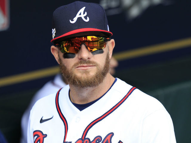 ATLANTA, GA - OCTOBER 11: Atlanta Braves left fielder Robbie Grossman (15) looks on before Game 1 of the NLDS between the Atlanta Braves and the Philadephia Phillies on October 11, 2022 at Truist Park in Atlanta, Georgia.