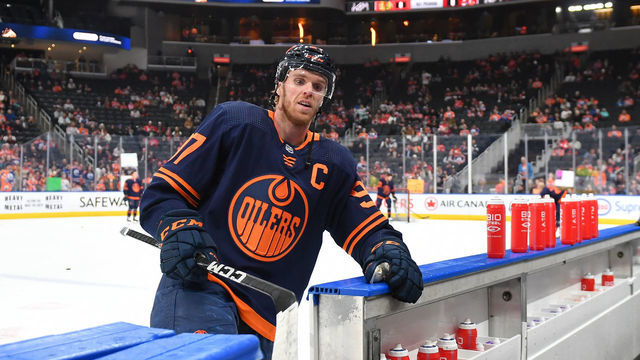 EDMONTON, CANADA - FEBRUARY 15: Connor McDavid #97 of the Edmonton Oilers steps off the ice after warm ups before the game against the Detroit Red Wings on February 15, 2023 at Rogers Place in Edmonton, Alberta, Canada.