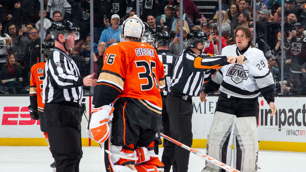 ANAHEIM, CA - FEBRUARY 17: Goaltender Pheonix Copley #29 of the Los Angeles Kings and goaltender John Gibson #36 of the Anaheim Ducks exchange words as Copley leaves the ice after a scrum during the second period of the game at Honda Center on February 17, 2023 in Anaheim, California. Copley was assessed a match penalty for the play.