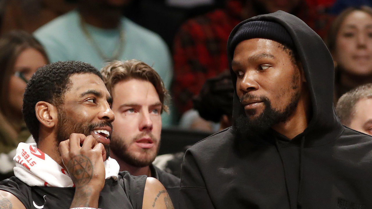 NEW YORK, NEW YORK - JANUARY 30: (NEW YORK DAILIES OUT) Kyrie Irving #11 (L) and Kevin Durant #7 of the Brooklyn Nets look on against the Los Angeles Lakers at Barclays Center on January 30, 2023 in New York City. The Nets defeated the Lakers 121-104.