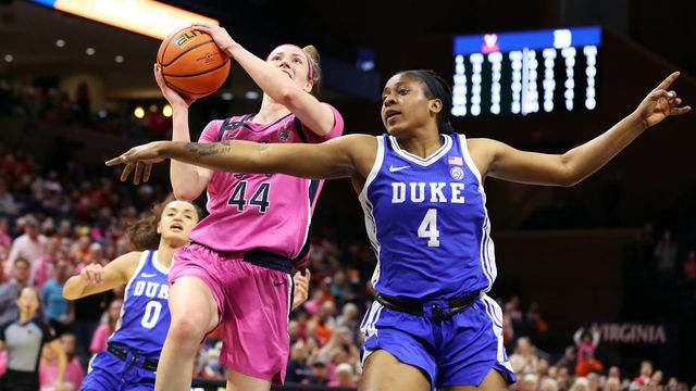CHARLOTTESVILLE, VA - FEBRUARY 19: McKenna Dale #44 of the Virginia Cavaliers shoots over Elizabeth Balogun #4 of the Duke Blue Devils in the second half during a game at John Paul Jones Arena on February 19, 2023 in Charlottesville, Virginia.