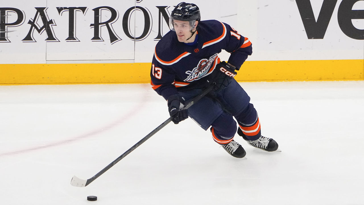 ELMONT, NY - JANUARY 21: New York Islanders Center Mathew Barzal (13) skates with the puck during the third period of the National Hockey League game between the Carolina Hurricanes and New York Islander on January 21, 2023, at UBS Arena in Elmont, NY.