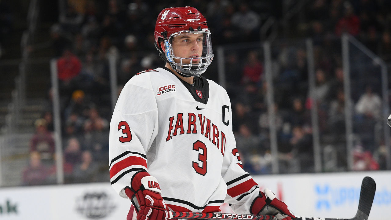 BOSTON, MA - FEBRUARY 06: Harvard Crimson defenseman Henry Thrun (3) looks on during a Dunkin' Beanpot semifinal game between the Boston College Eagles and the Harvard Crimson on February 6, 2023, at TD Garden in Boston, MA.