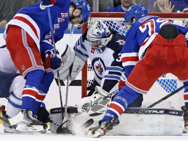 Hellebuyck makes 50 saves to lead Jets past Rangers