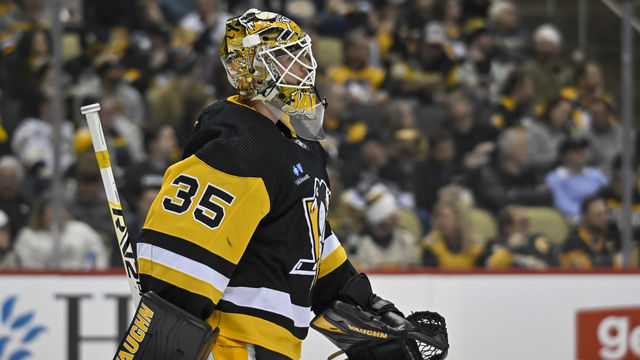 PITTSBURGH, PA - FEBRUARY 20: Pittsburgh Penguins Goalie Tristan Jarry (35) looks on during the second period in the NHL game between the Pittsburgh Penguins and the New York Islanders on February 20, 2023, at PPG Paints Arena in Pittsburgh, PA.
