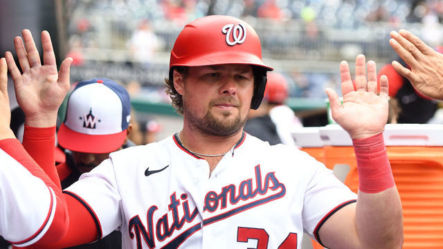 WASHINGTON, DC - OCTOBER 01: Luke Voit #34 of the Washington Nationals celebrates scoring on Ildemaro Vargas #14 hit in the seventh inning during game one of a doubleheader baseball game against the Philadelphia Phillies at Nationals Park on October 1, 2022 in Washington, DC.