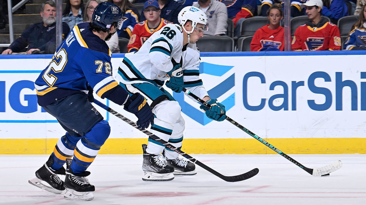 ST. LOUIS, MO - NOVEMBER 10: Justin Faulk #72 of the St. Louis Blues defends against Timo Meier #28 of the San Jose Sharks at the Enterprise Center on November 10, 2022 in St. Louis, Missouri.