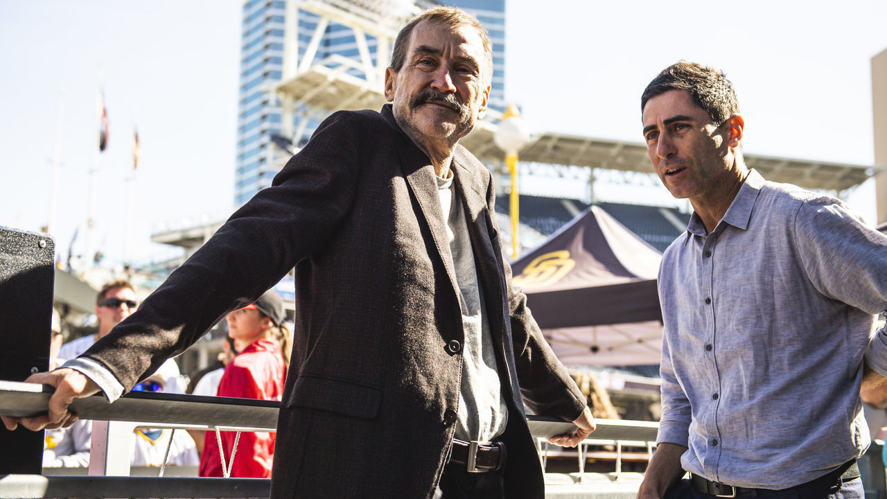 SAN DIEGO, CA - FEBRUARY 04: San Diego Padres Chairman Peter Seidler and President of Baseball Operations and General Manager A.J. Preller talk during the San Diego Padres Fan Fest at PETCO Park on February 4, 2023 in San Diego, California.
