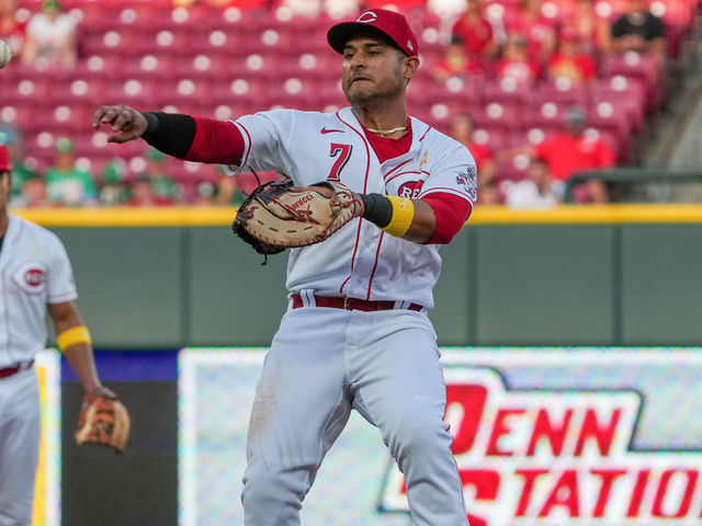 CINCINNATI, OHIO - SEPTEMBER 02: Donovan Solano #7 of the Cincinnati Reds throws to first base in the second inning against the Colorado Rockies at Great American Ball Park on September 02, 2022 in Cincinnati, Ohio.