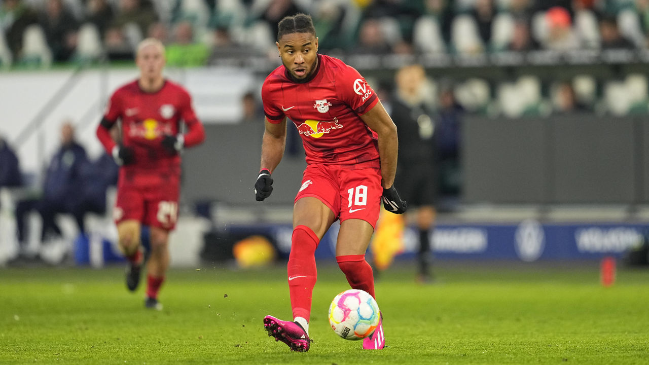 WOLFSBURG, GERMANY - FEBRUARY 18: Christopher Nkunku of RB Leipzig controls the ball during the Bundesliga match between VfL Wolfsburg and RB Leipzig at Volkswagen Arena on February 18, 2023 in Wolfsburg, Germany.