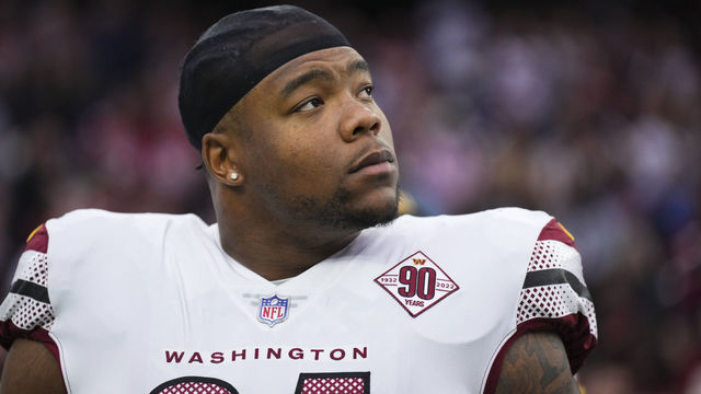 HOUSTON, TX - NOVEMBER 20: Daron Payne #94 of the Washington Commanders stands during the national anthem against the Houston Texans at NRG Stadium on November 20, 2022 in Houston, Texas.