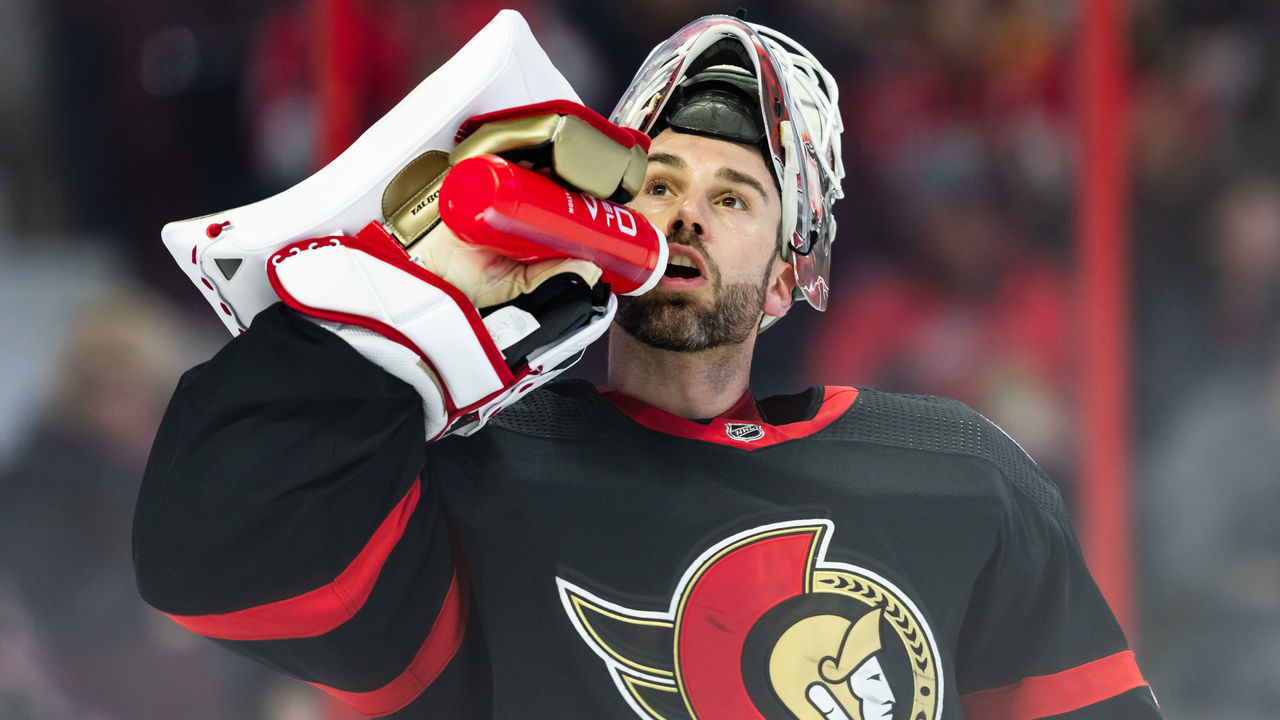 OTTAWA, ON - JANUARY 25: Ottawa Senators Goalie Cam Talbot (33) takes a drink during first period National Hockey League action between the New York Islanders and Ottawa Senators on January 25, 2023, at Canadian Tire Centre in Ottawa, ON, Canada.