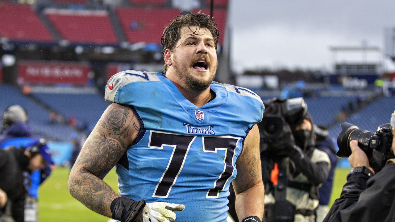 NASHVILLE, TENNESSEE - JANUARY 2: Taylor Lewan #77 of the Tennessee Titans celebrates after a game against the Miami Dolphins at Nissan Stadium on January 2, 2022 in Nashville, Tennessee. The Titans defeated the Dolphins 34-3.