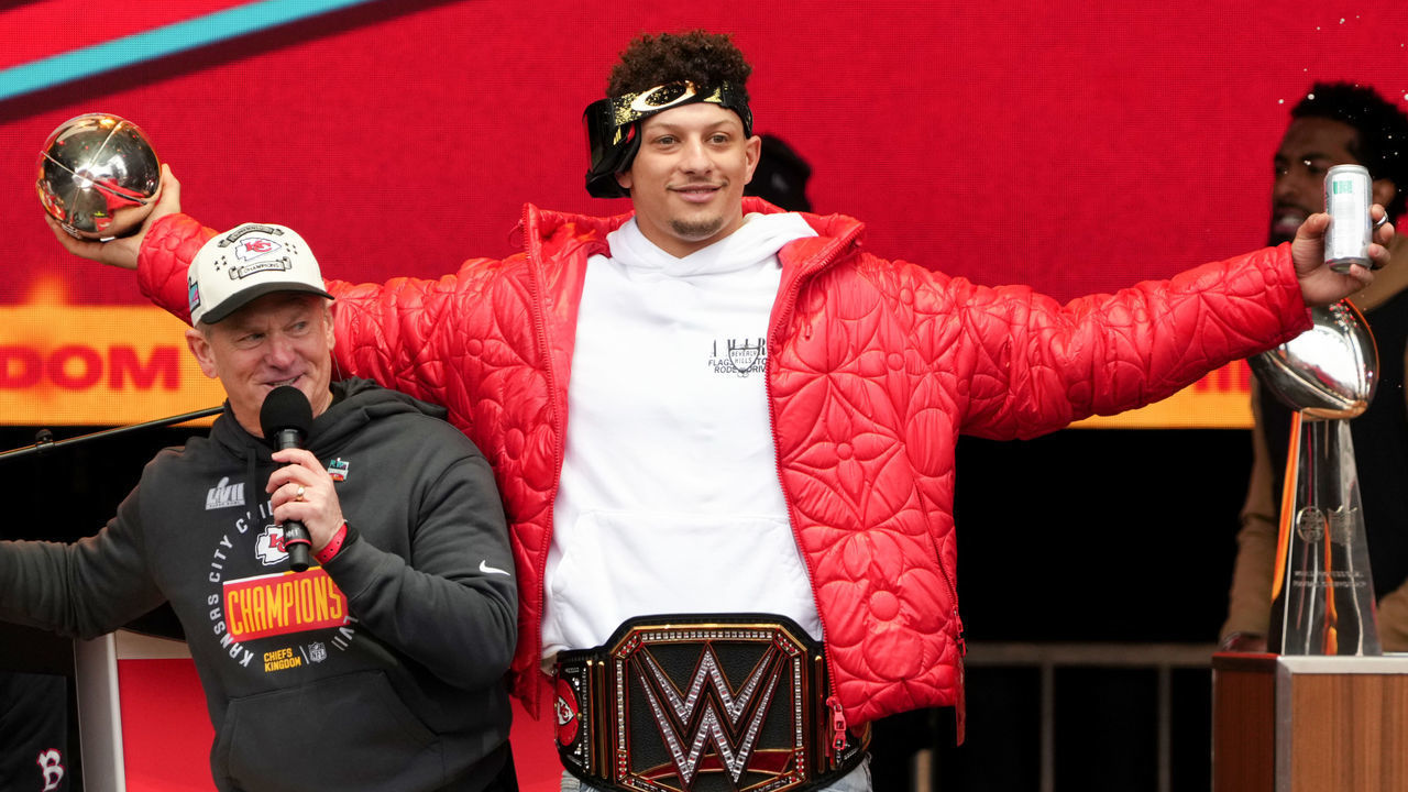 KANSAS CITY, MISSOURI - FEBRUARY 15: Patrick Mahomes #15 of the Kansas City Chiefs celebrates on stage during the Kansas City Chiefs Super Bowl LVII victory parade on February 15, 2023 in Kansas City, Missouri.
