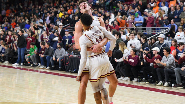 CHESTNUT HILL, MA - FEBRUARY 22: Boston College Eagles forward Quinten Post (12) and Boston College Eagles guard Makai Ashton-Langford (11) celebrate following a college basketball game between the Virginia Cavaliers and the Boston College Eagles on February 22, 2023, at Conte Forum in Chestnut Hill, MA. The Eagles defeated the Cavaliers 63-48.