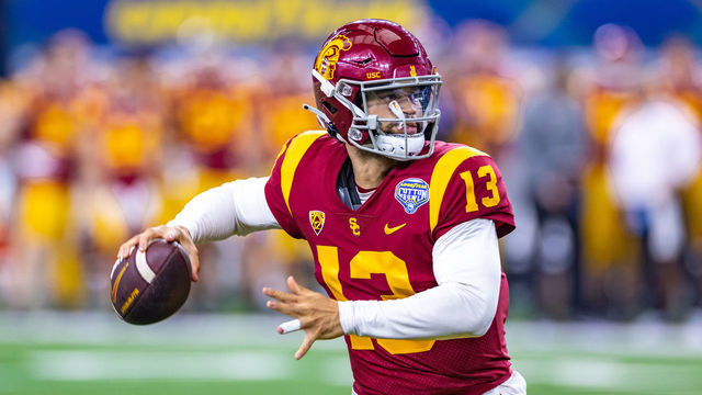 ARLINGTON, TX - JANUARY 02: USC Trojans quarterback Caleb Williams (#13) throws a pass during the Goodyear Cotton Bowl game between the USC Trojans and Tulane Green Wave on January 02, 2023 at AT&T Stadium in Arlington, TX.