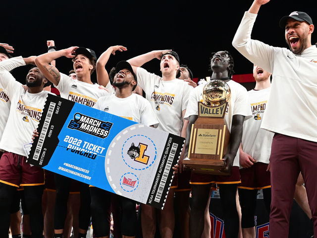 ST. LOUIS, MO - MARCH 06: Loyola players react to game highlights on the Jumbotron after the championship game of the Missouri Valley Conference Tournament between the Loyola Chicago Ramblers and the Drake Bulldogs on March 06, 2022, at Enterprise Center, St. Louis , MO. ,