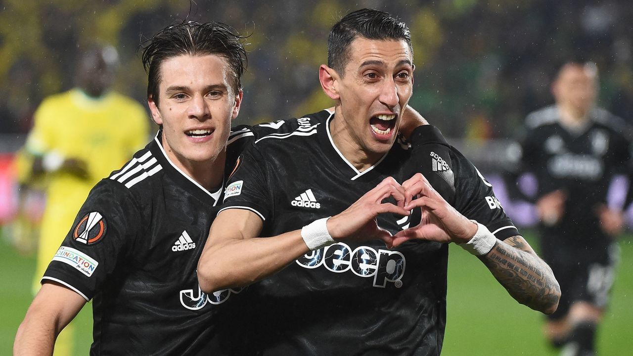Juventus' Argentine forward Angel Di Maria (R) celebrates with Juventus' Italian midfielder Nicolo Fagioli (L) after scoring his team's second goal during the UEFA Europa League round of 32, second leg football match between FC Nantes and Juventus FC, at The Stade de la Beaujoire in Nantes on February 23, 2023.