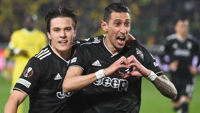 Juventus' Argentine forward Angel Di Maria (R) celebrates with Juventus' Italian midfielder Nicolo Fagioli (L) after scoring his team's second goal during the UEFA Europa League round of 32, second leg football match between FC Nantes and Juventus FC, at The Stade de la Beaujoire in Nantes on February 23, 2023.