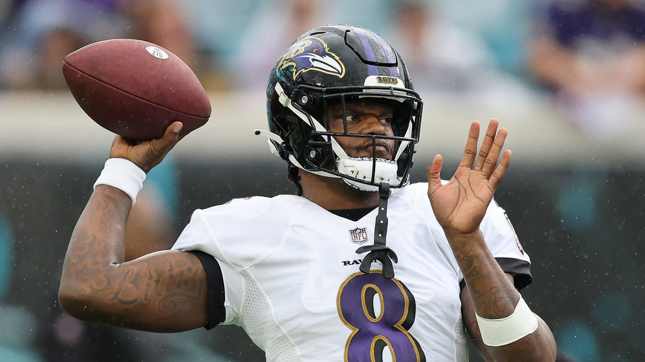JACKSONVILLE, FLORIDA - NOVEMBER 27: Lamar Jackson #8 of the Baltimore Ravens warms up prior to the game against the Jacksonville Jaguars at TIAA Bank Field on November 27, 2022 in Jacksonville, Florida.
