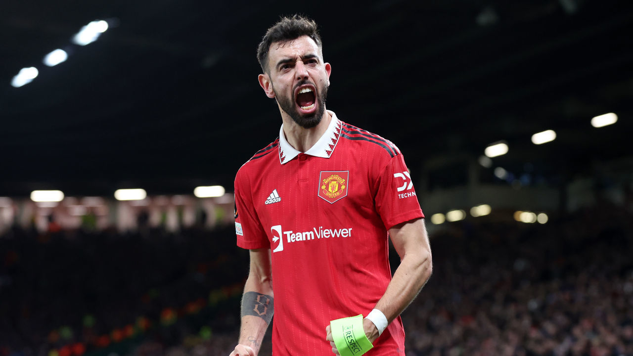 MANCHESTER, ENGLAND - FEBRUARY 23: Bruno Fernandes of Manchester United celebrates after teammate Antony (not pictured) scores the team's second goal during the UEFA Europa League knockout round play-off leg two match between Manchester United and FC Barcelona at Old Trafford on February 23, 2023 in Manchester, England.