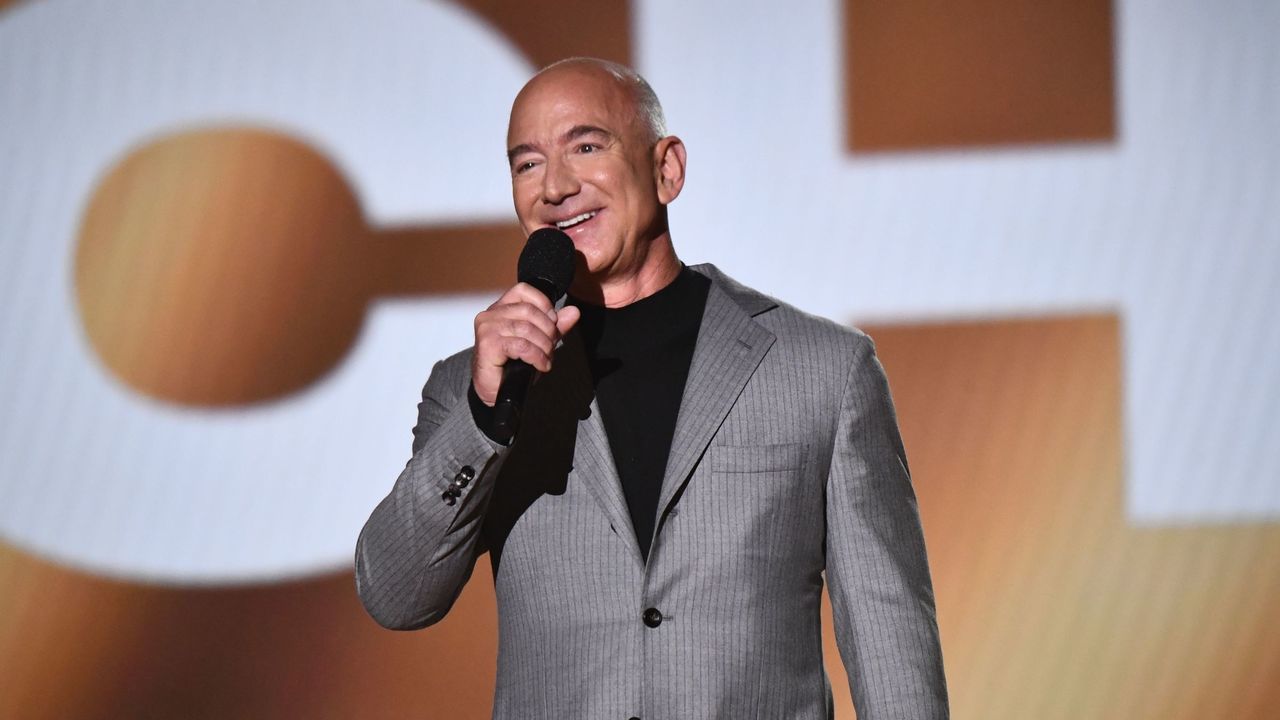SANTA MONICA, CALIFORNIA - DECEMBER 07: Jeff Bezos speaks onstage during the 2021 People's Choice Awards at Barker Hangar on December 07, 2021 in Santa Monica, California.