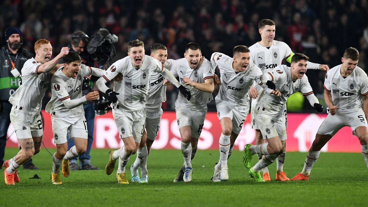 Shakhtar's players celebrate as they win in a penalty shoot-out after the UEFA Europa League play-off second-leg football match between Stade Rennais FC and Shakhtar Donetsk at the Roazhon Park stadium in Rennes, western France, on February 23, 2023.