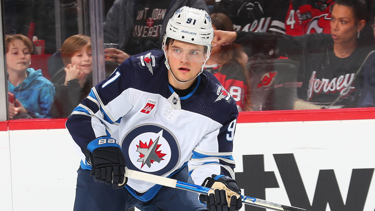 NEWARK, NJ - FEBRUARY 19: Cole Perfetti #91 of the Winnipeg Jets during the game against the New Jersey Devils on February 19, 2023 at the Prudential Center in Newark, New Jersey.