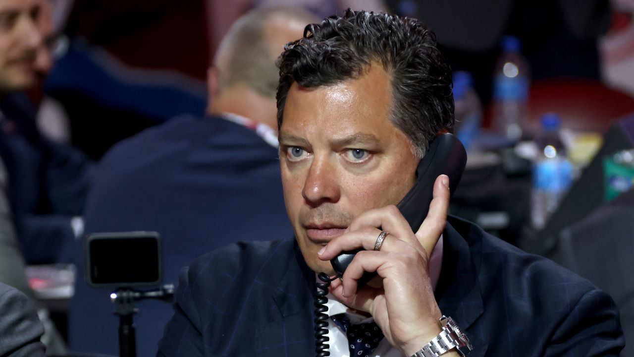 MONTREAL, QUEBEC - JULY 08: General manager Bill Guerin of the Minnesota Wild looks on from the draft table during the 2022 Upper Deck NHL Draft at Bell Centre on July 08, 2022 in Montreal, Quebec.