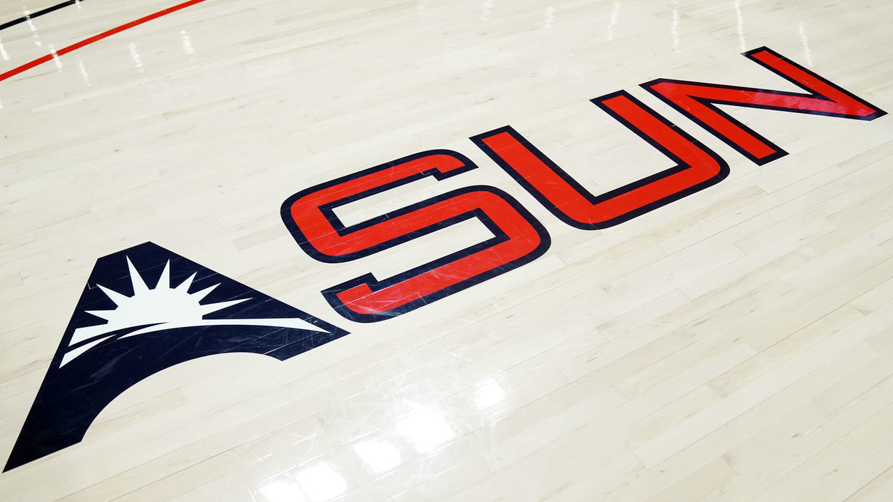 LYNCHBURG, VIRGINIA - JANUARY 27: The ASUN logo on the floor before a college basketball game between the Liberty Flames andd the North Alabama Lions at the Liberty Arena on January 27, 2022 in Lynchburg, Virginia.