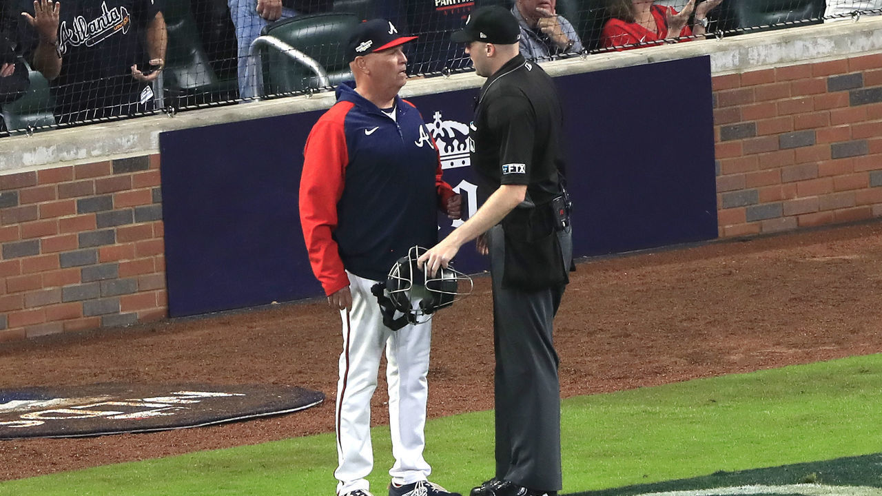 ATLANTA, GA - OCTOBER 12: Atlanta Braves manager Brian Snitker (43) confers with the umpire about a foul ball call during Game 2 of the NLDS between the Atlanta Braves and the Philadelphia Phillies on October 12, 2022 at Truist Park in Atlanta, Georgia.