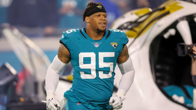 JACKSONVILLE, FLORIDA - JANUARY 8: Roy Robertson-Harris #95 of the Jacksonville Jaguars is introduced before the game against the Tennessee Titans at TIAA Bank Field on January 8, 2023 in Jacksonville, Florida.