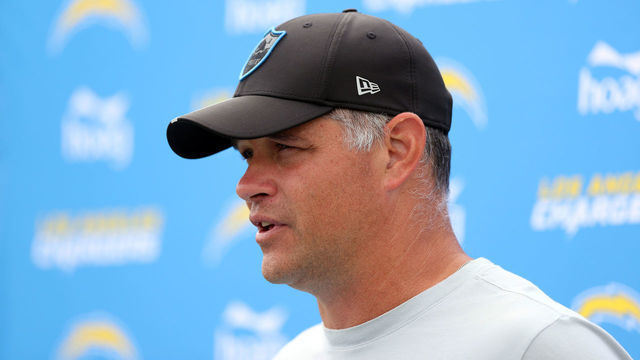 COSTA MESA, CALIFORNIA - AUGUST 06: Offensive coordinator Joe Lombardi of the Los Angeles Chargers talks with the media during Los Angeles Chargers training camp at Jack Hammett Sports Complex on August 06, 2021 in Costa Mesa, California.