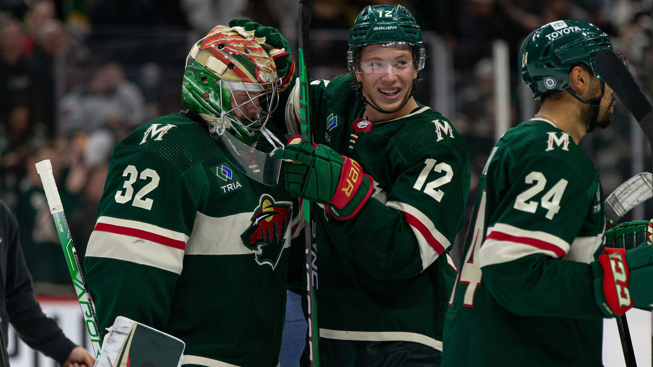 SAINT PAUL, MN - FEBRUARY 17: Minnesota Wild goaltender Filip Gustavsson (32) celebrates a win with Minnesota Wild left wing Matt Boldy (12) after the NHL game between the Dallas Stars and the Minnesota Wild, on February 17th, 2023, at the Xcel Energy Center in Saint Paul, MN.