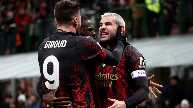 MILAN, ITALY - FEBRUARY 26: Theo Hernandez of AC Milan celebrates with teammates after their shot is deflected into the goal by Juan Musso of Atalanta BC ( not pictured ), which results in the first goal for AC Milan, during the Serie A match between AC MIlan and Atalanta BC at Stadio Giuseppe Meazza on February 26, 2023 in Milan, Italy.